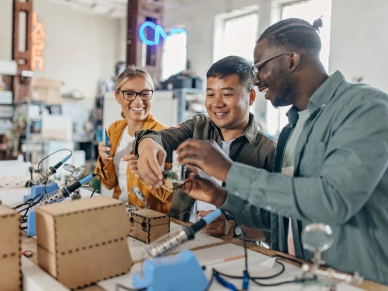 University students work in the Training Centre on  creating new products. Education in Fablab. Innovative technologies of manufacturing.